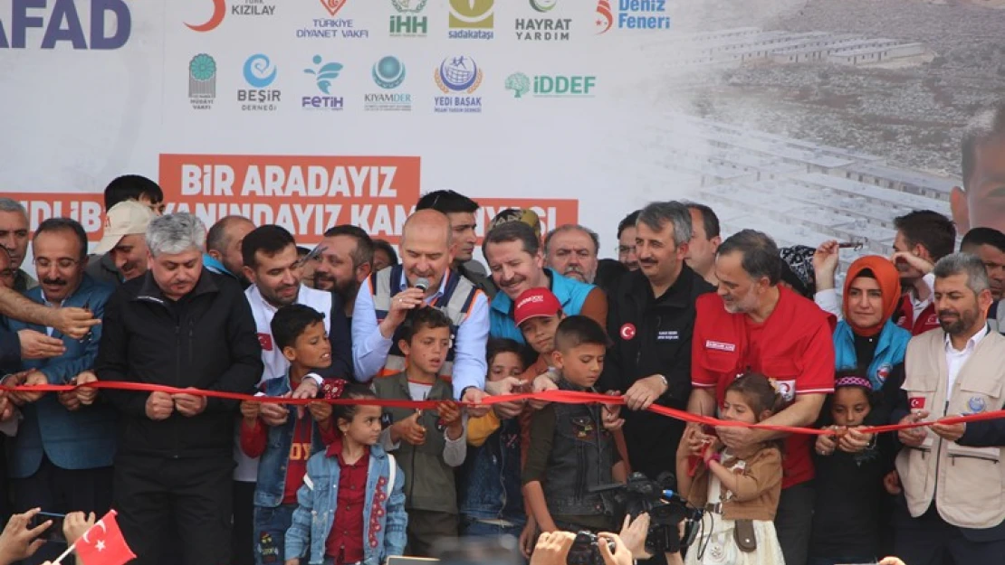 İdlib'de briket evlerin anahtar teslim törenine katıldı