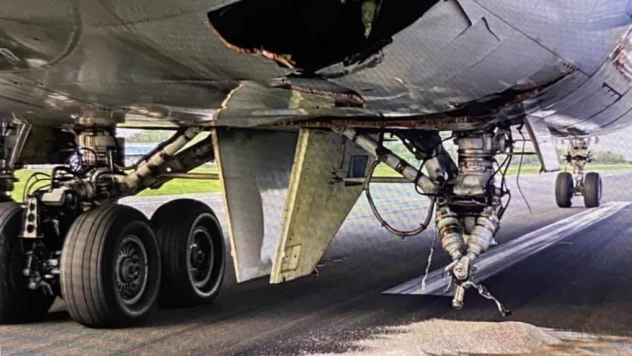 Acil iniş yapan kargo uçağının iniş takımı koptu